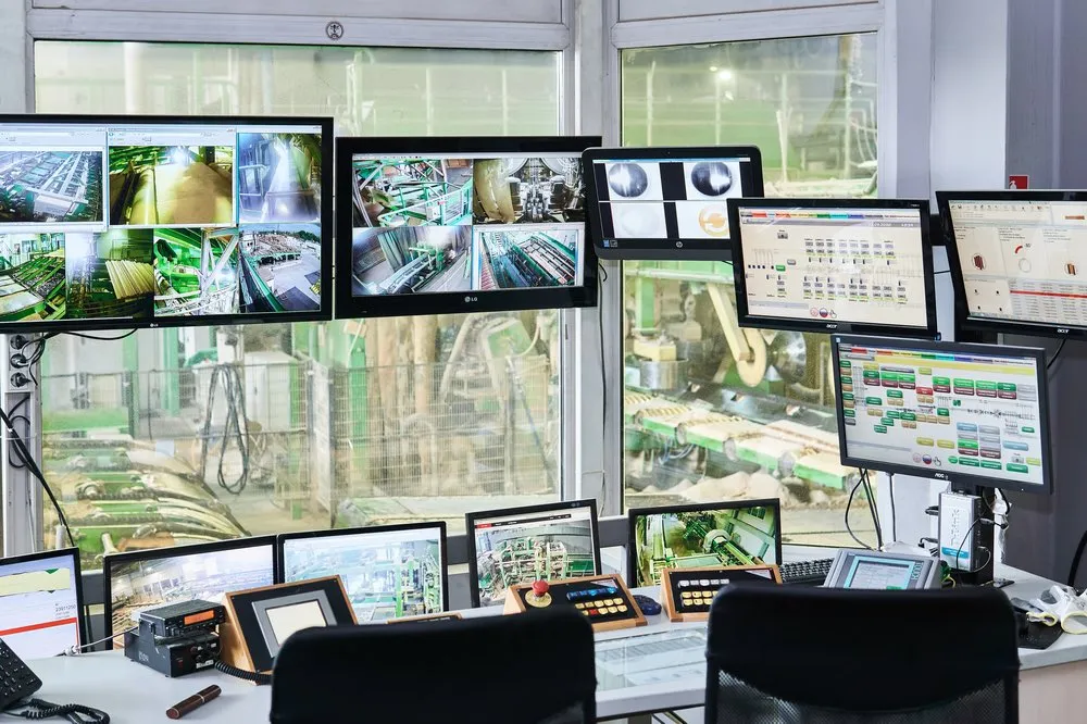 Industrial Automation and IT Systems: Implementation and Operational Experience